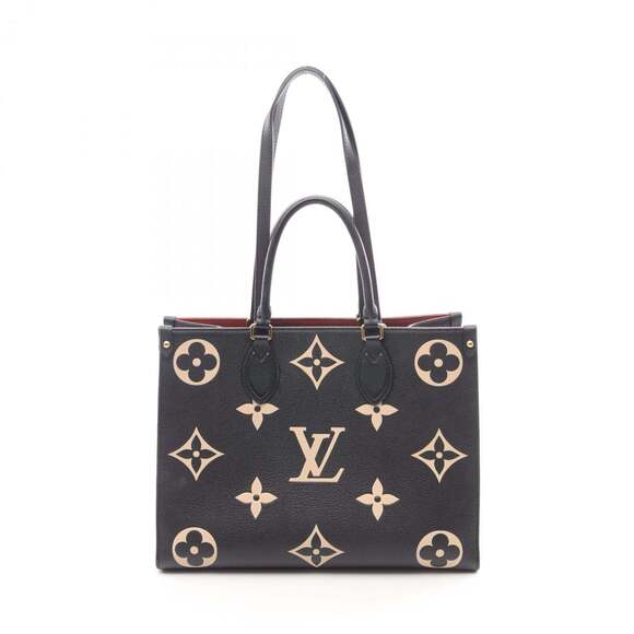 LOUIS VUITTON Handbags - Louis Vuitton On the Go MM Two-Tone Tote Bag in Monogram Empreinte Grained Le...